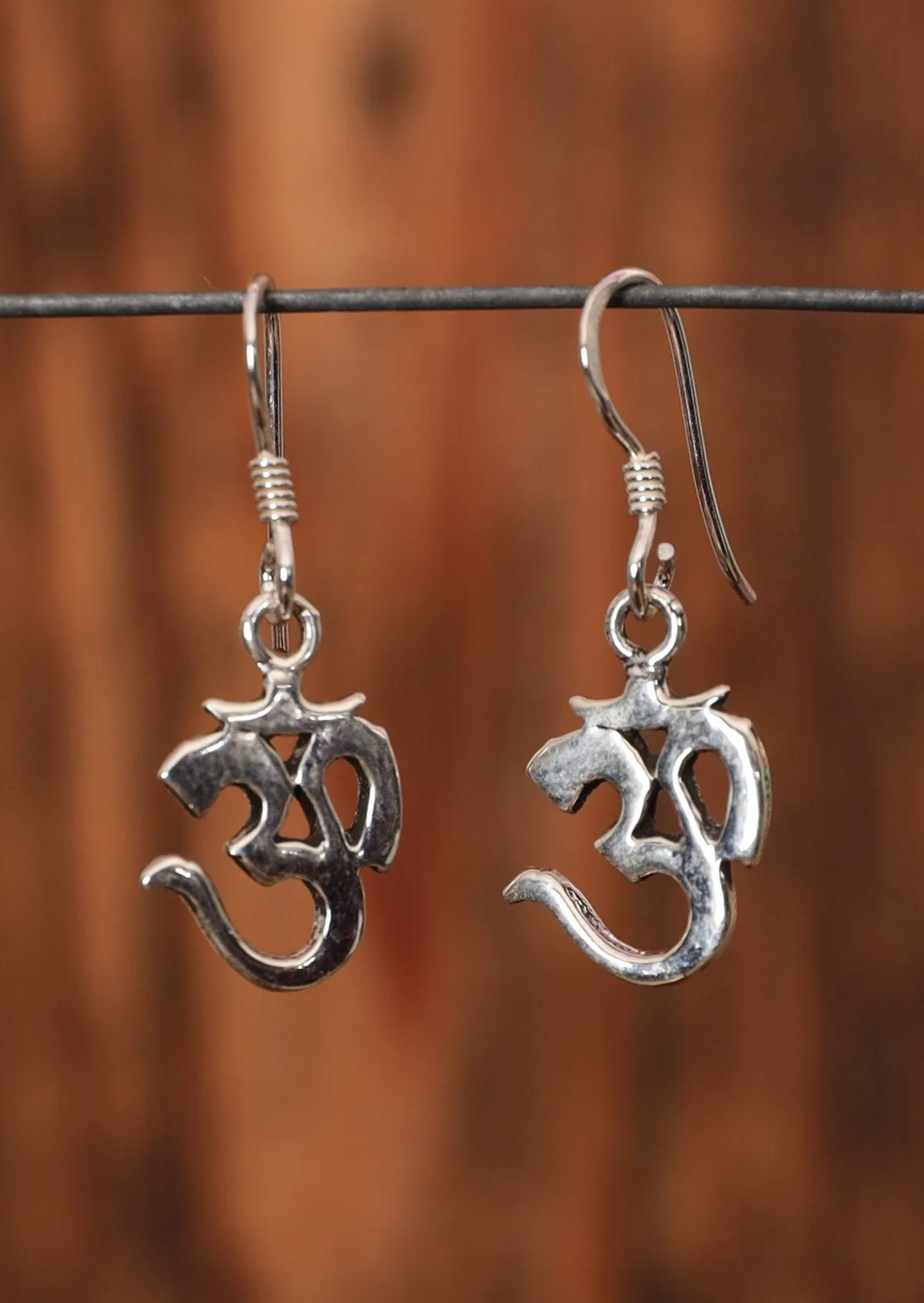 Om Silver Dangle Earrings